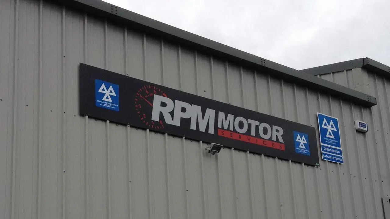 RPM Motor Services workshop building with MOT signage in Seaton